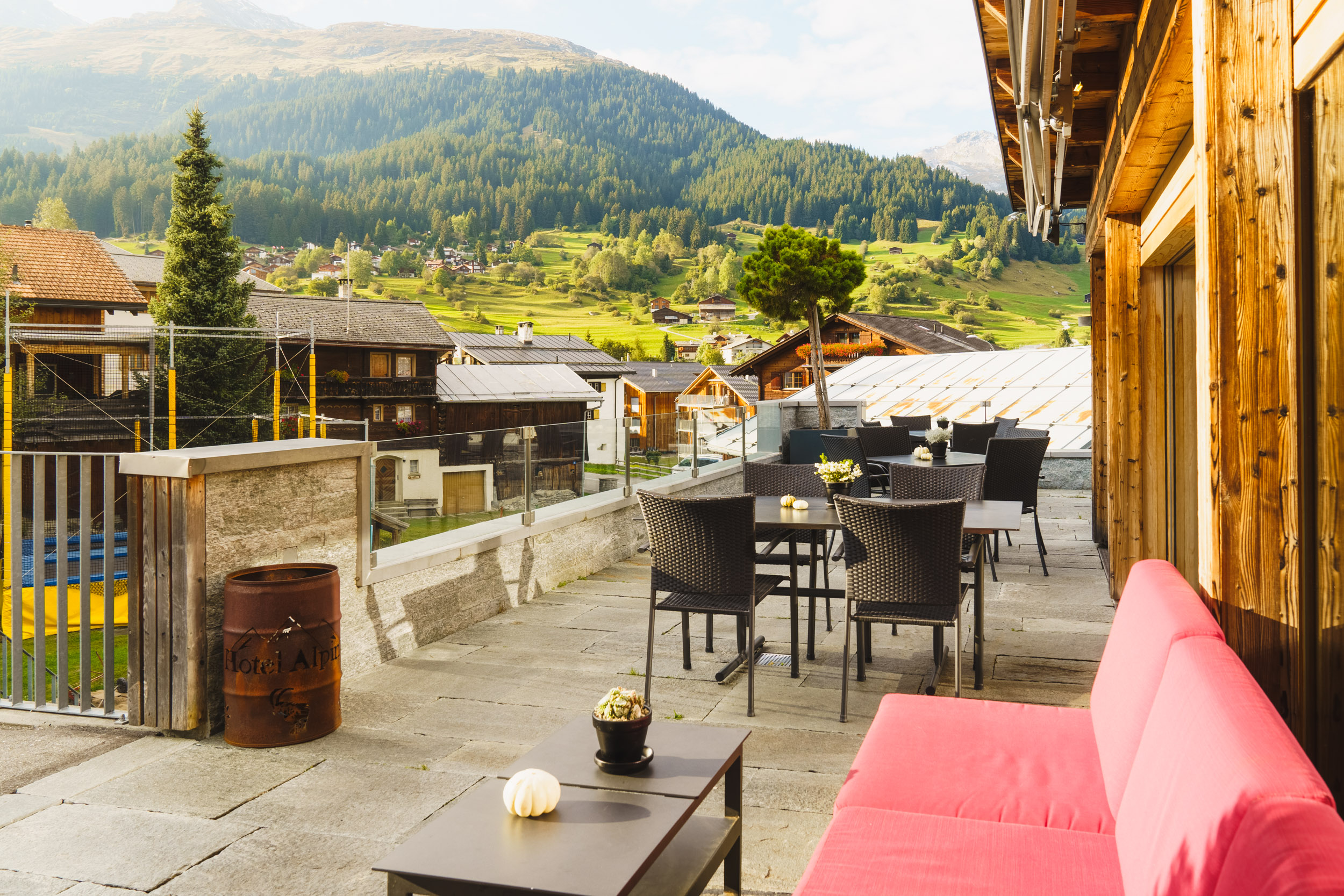 Sun terrace of Restaurant Alpina Brigels with mountain view