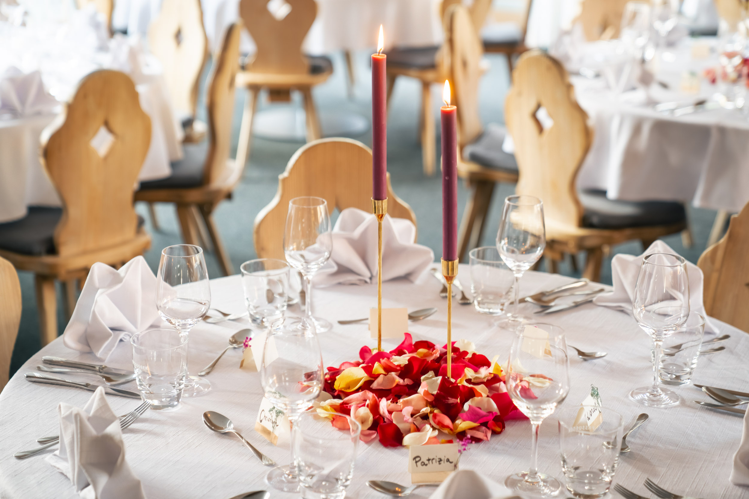 Wedding decoration on the table in the hall at Restaurant Alpina
