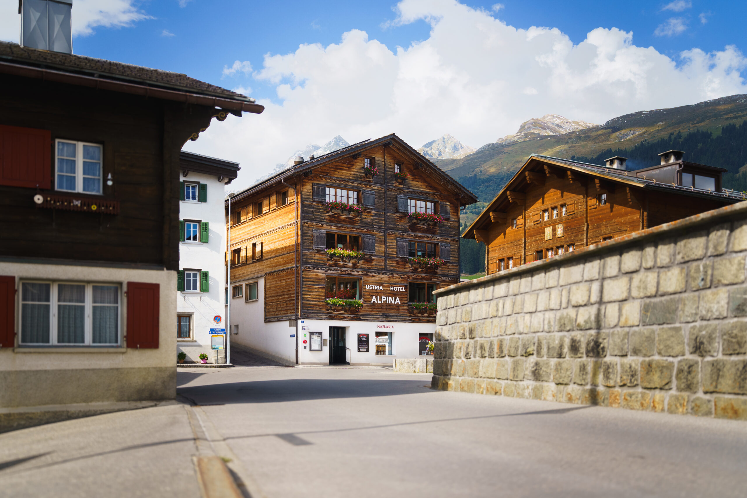 Hotel Restaurant Alpina in Breil Brigels Exterior view of the building in the village center