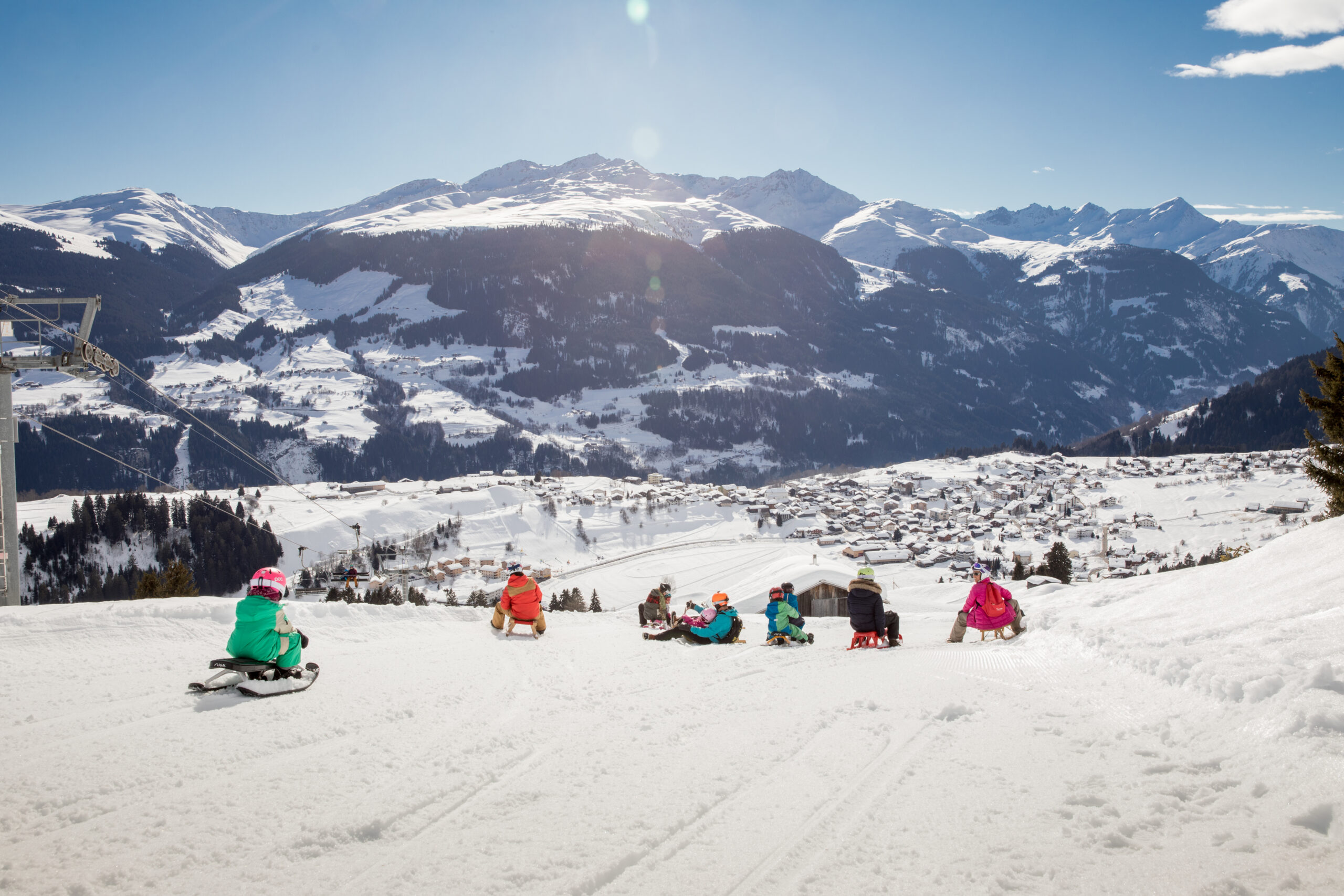 Sledding with the whole family in the Brigels ski area