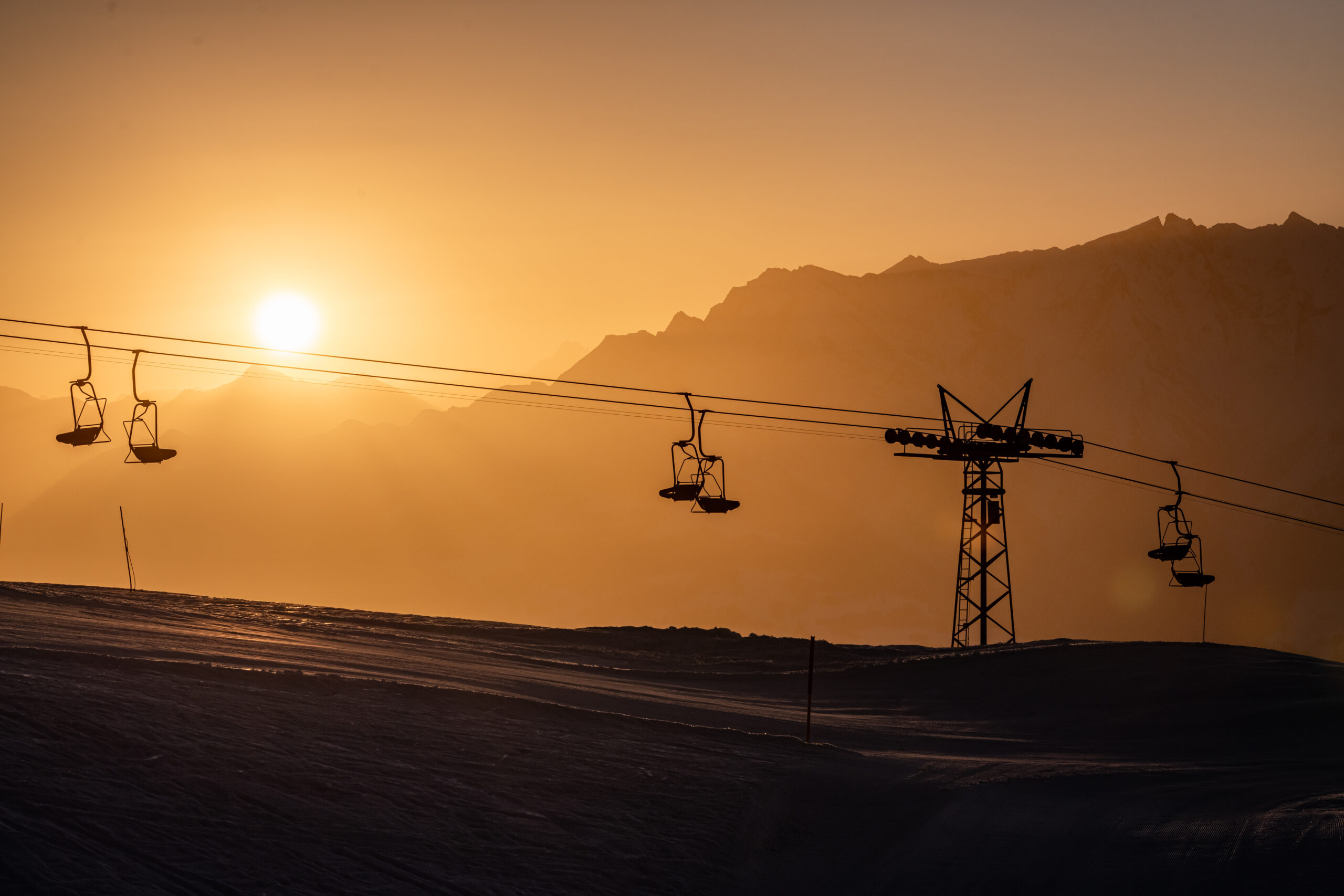 Sunrise over the ski area of Breil Brigels