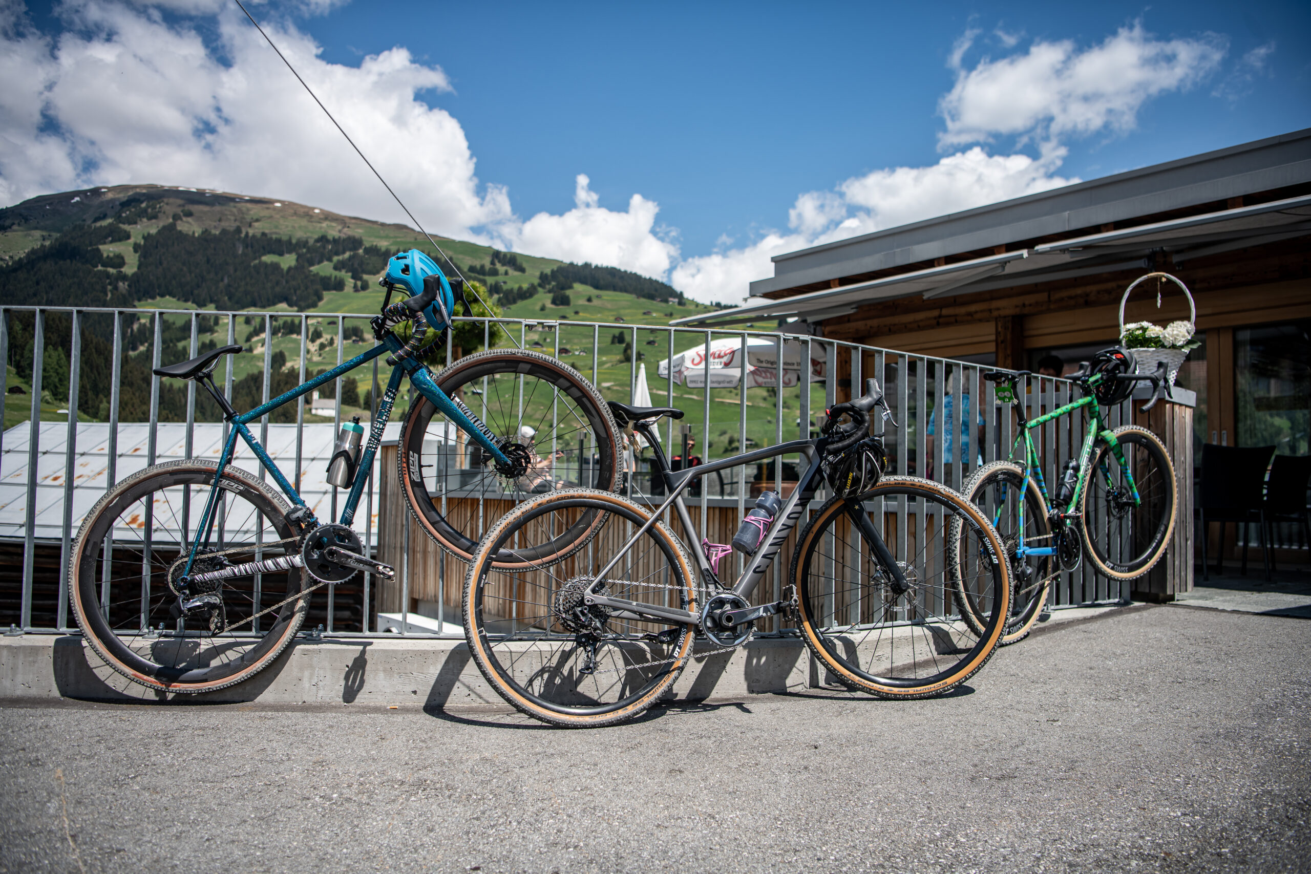 Gravel bikes parked in front of Restaurant Alpina in Brigels