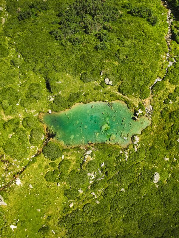 Clear, beautiful mountain lake above the village of Breil/Brigels